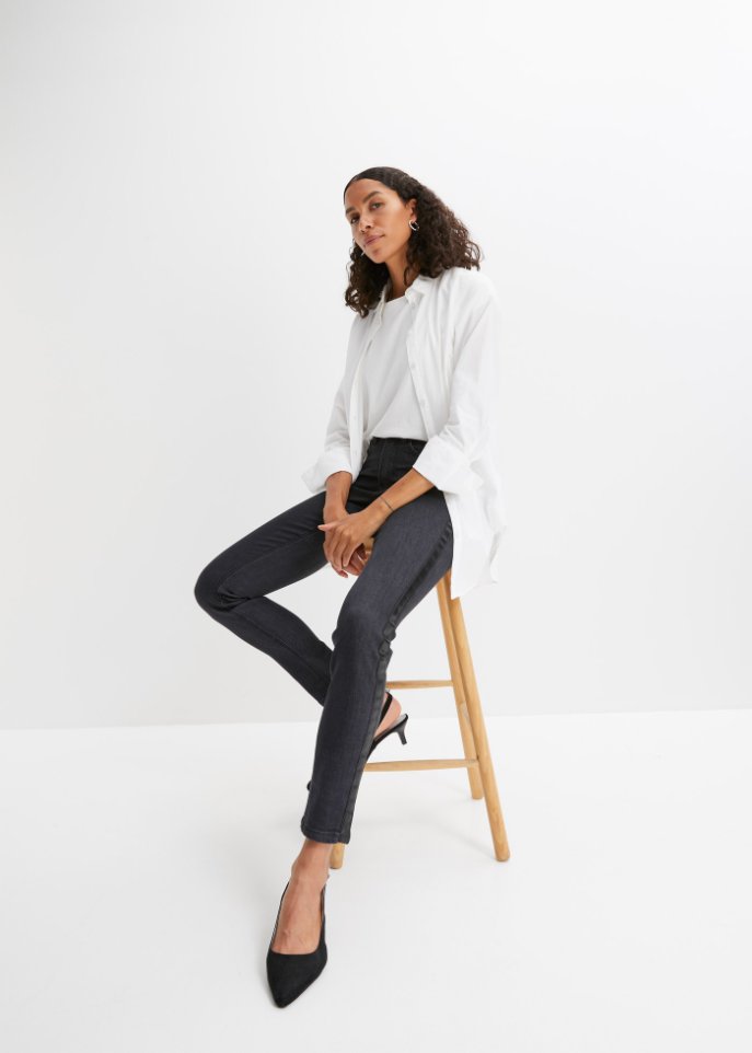 Stretch-Jeans mit Lederimitateinsatz