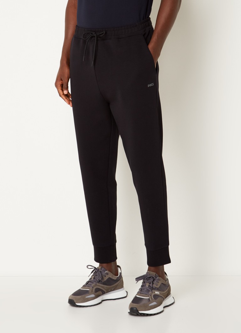 Calça de jogging HUGO BOSS Hadiko com corte afunilado e bolsos com costura.