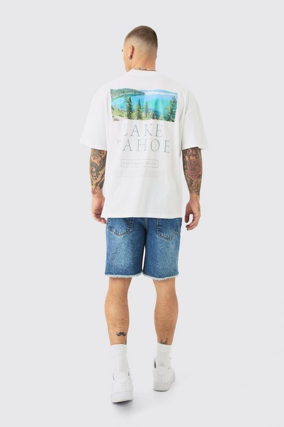 Hellblaue Slim-Fit Jeansshorts mit Rissen und Farbspritzern