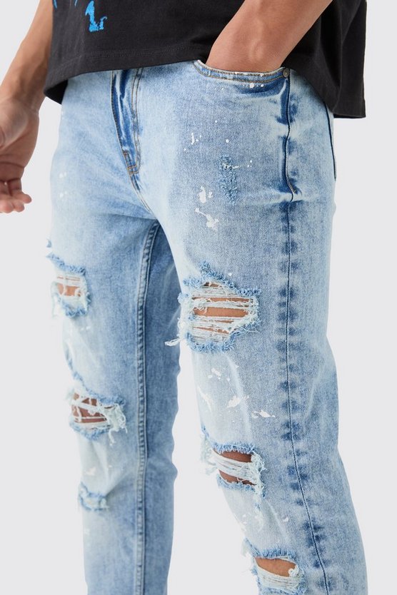 Zerrissene Skinny Stretch Jeans mit Farbspritzern