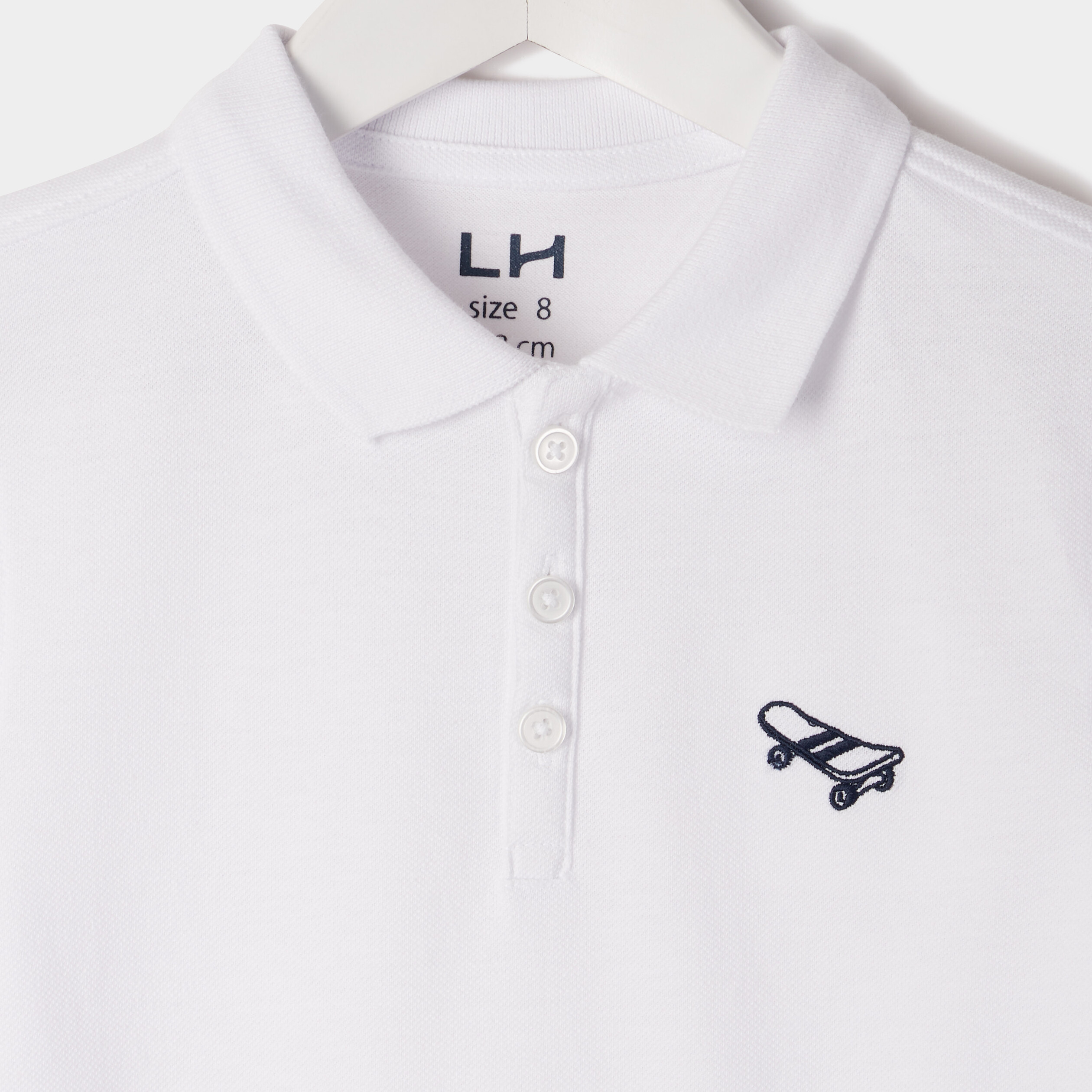 Polo manches courtes à détail brodé blanc garçon | La Halle