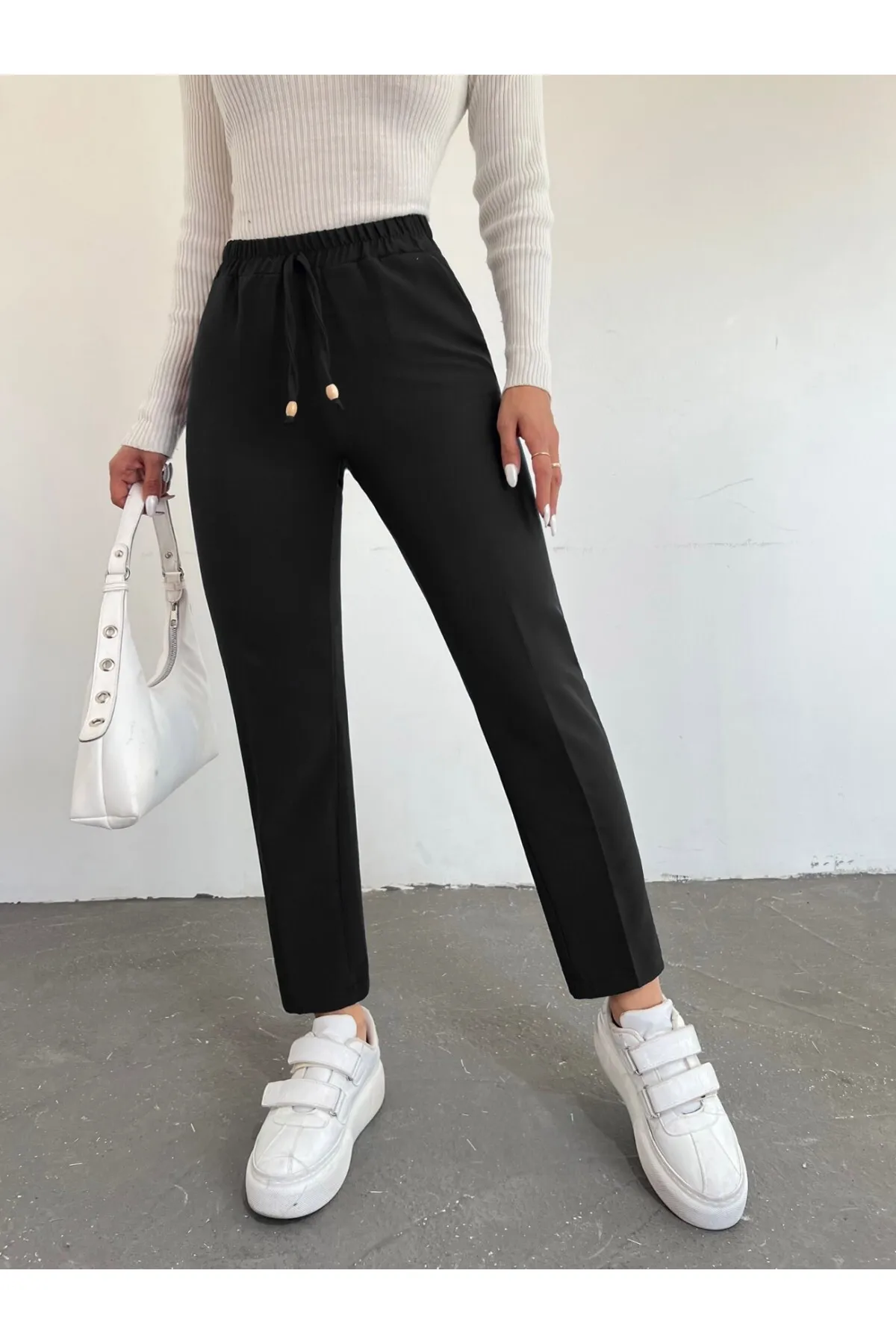 Modamorfo  Hose mit elastischem Bund und doppelter Tasche und Spitze