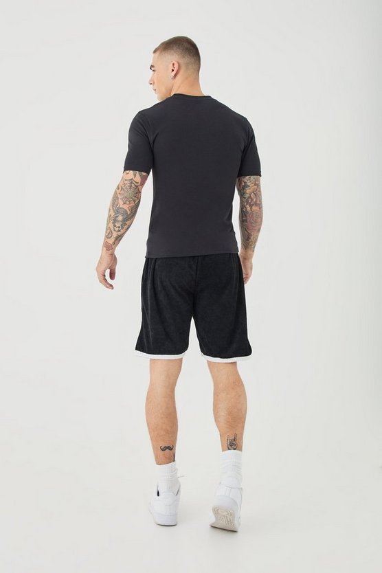 Lockere Frottee-Shorts mit Kontrast