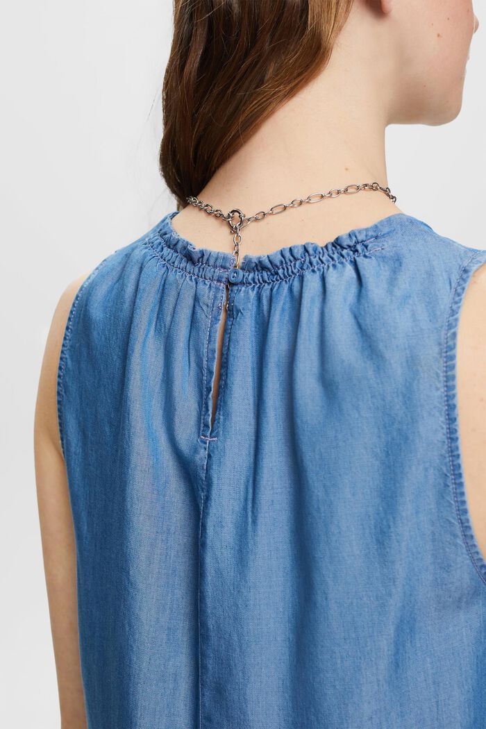 Ärmellose Bluse in Denim-Optik mit Rüschen