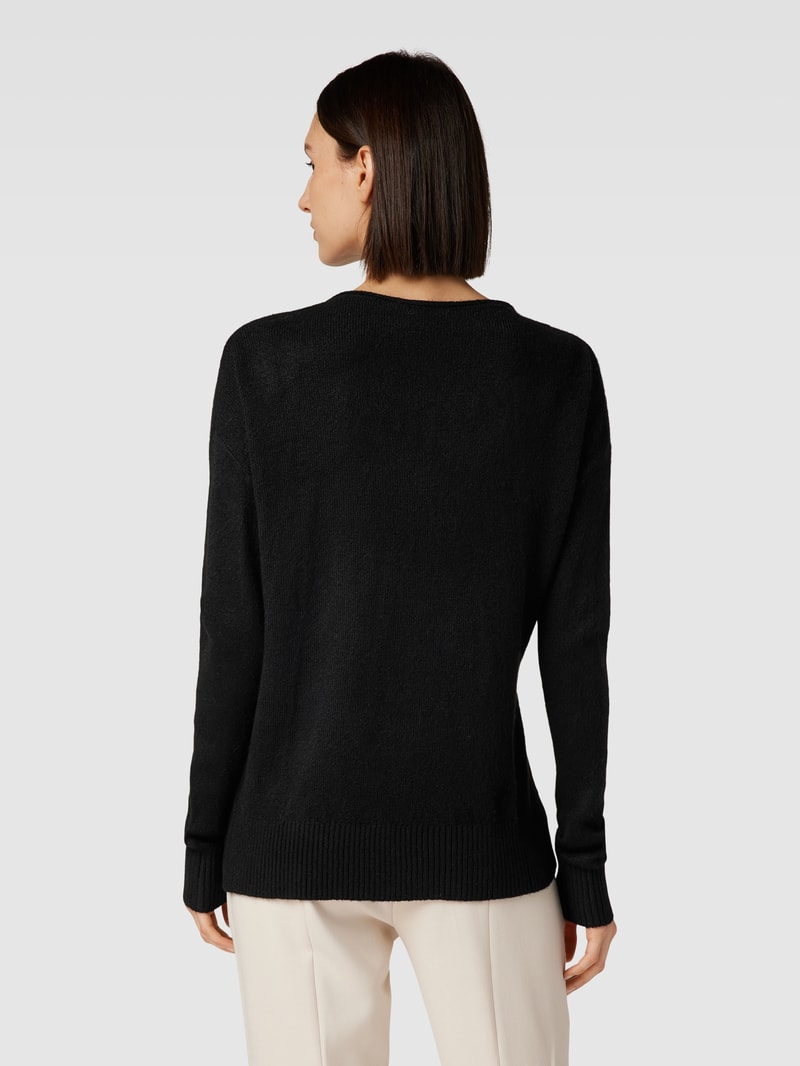 Strickpullover in melierter Optik in schwarz