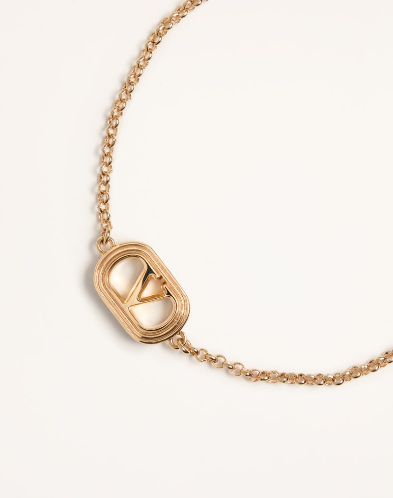 Ovalet armbånd i metal og Swarovski® perle