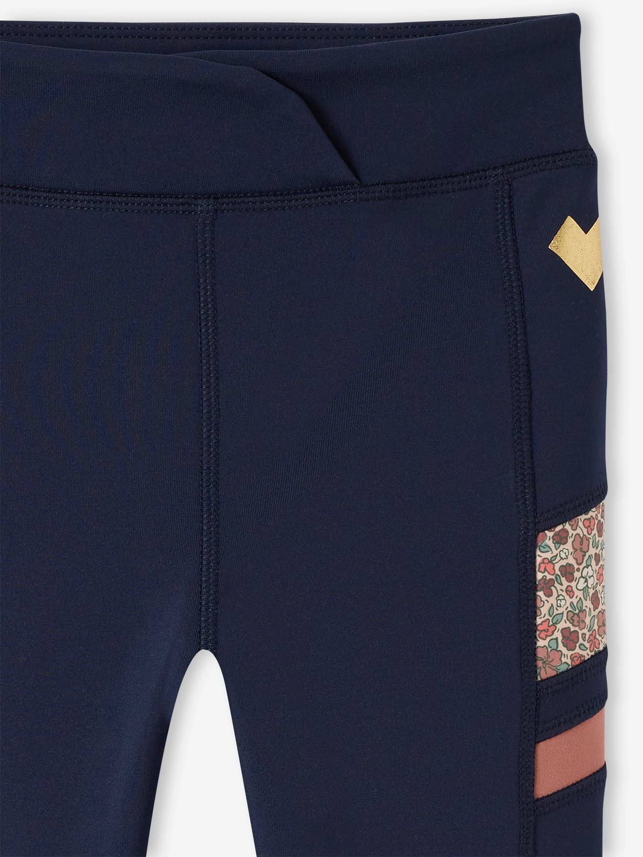Legging sport en matière technique fille détails côtés fantaisie marine