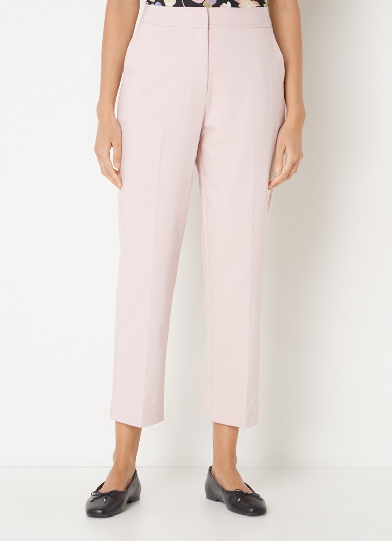Pantalonii Ulrica de la Phase Eight au talie înaltă, croială mulată și sunt confecționați din material elastic.