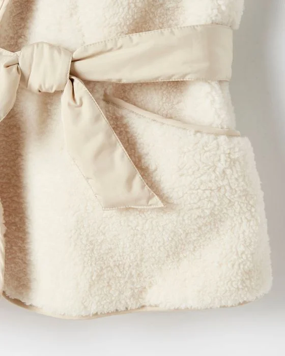 Veste sans manches en maille bouclette