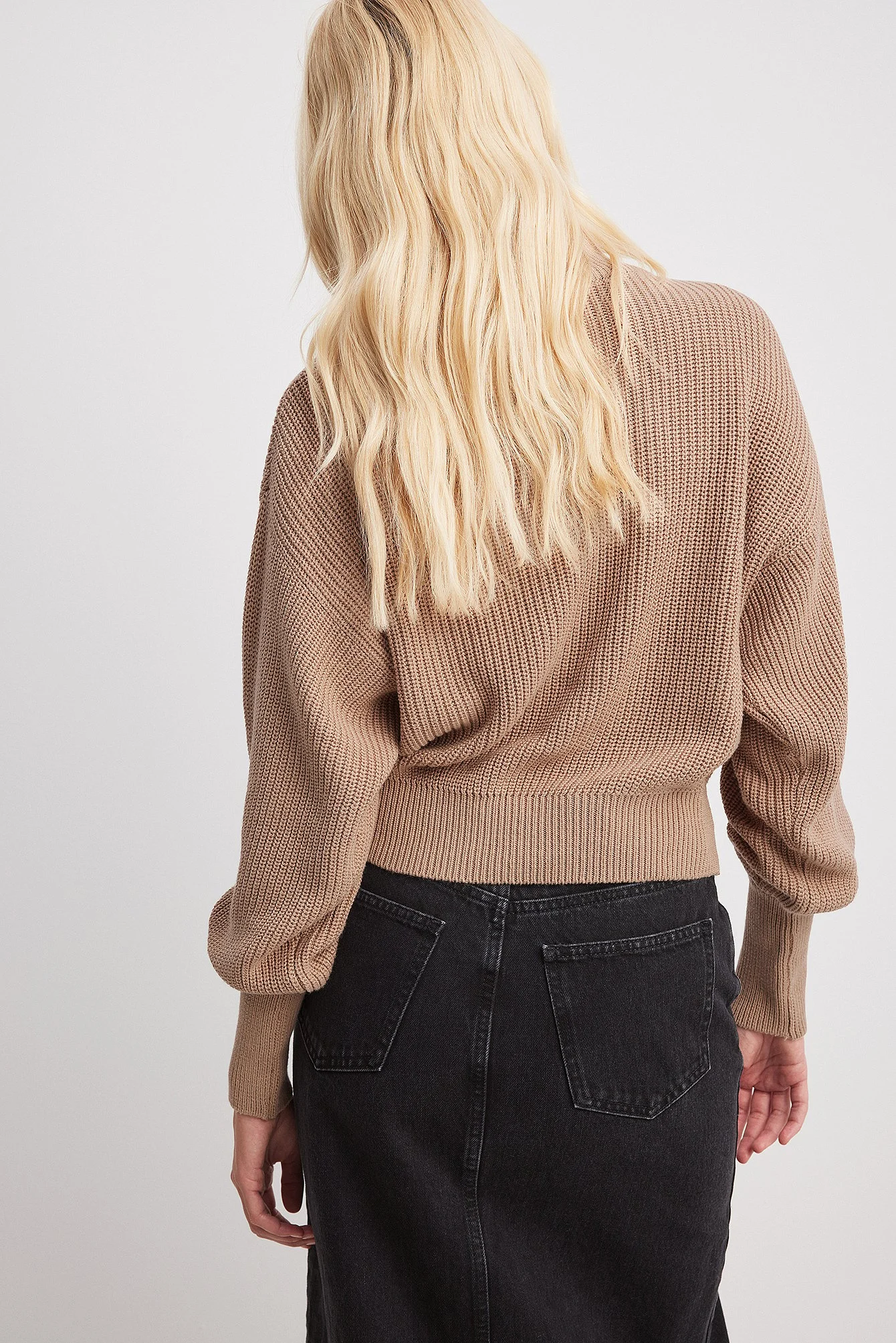 Strickpulli mit weiten Ärmeln