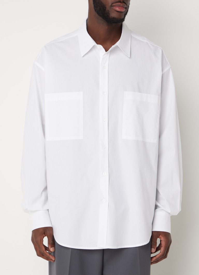 Camisa oversized Gus da Frankie Shop com bolsos no peito.