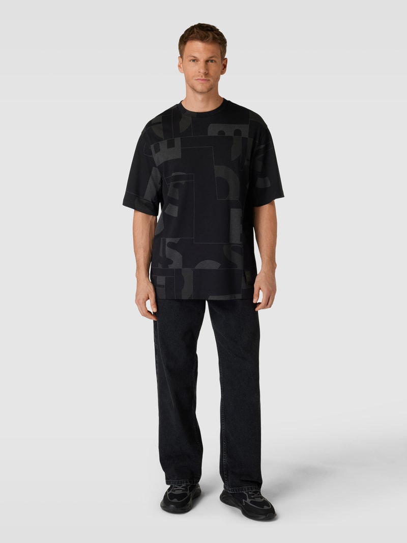 T-Shirt mit Statement-Print Modell 'Timono Lotus' in schwarz