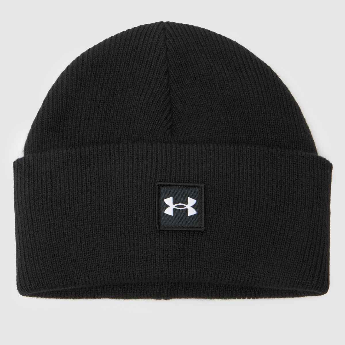 Under Armour svartvit mössa i halvtid