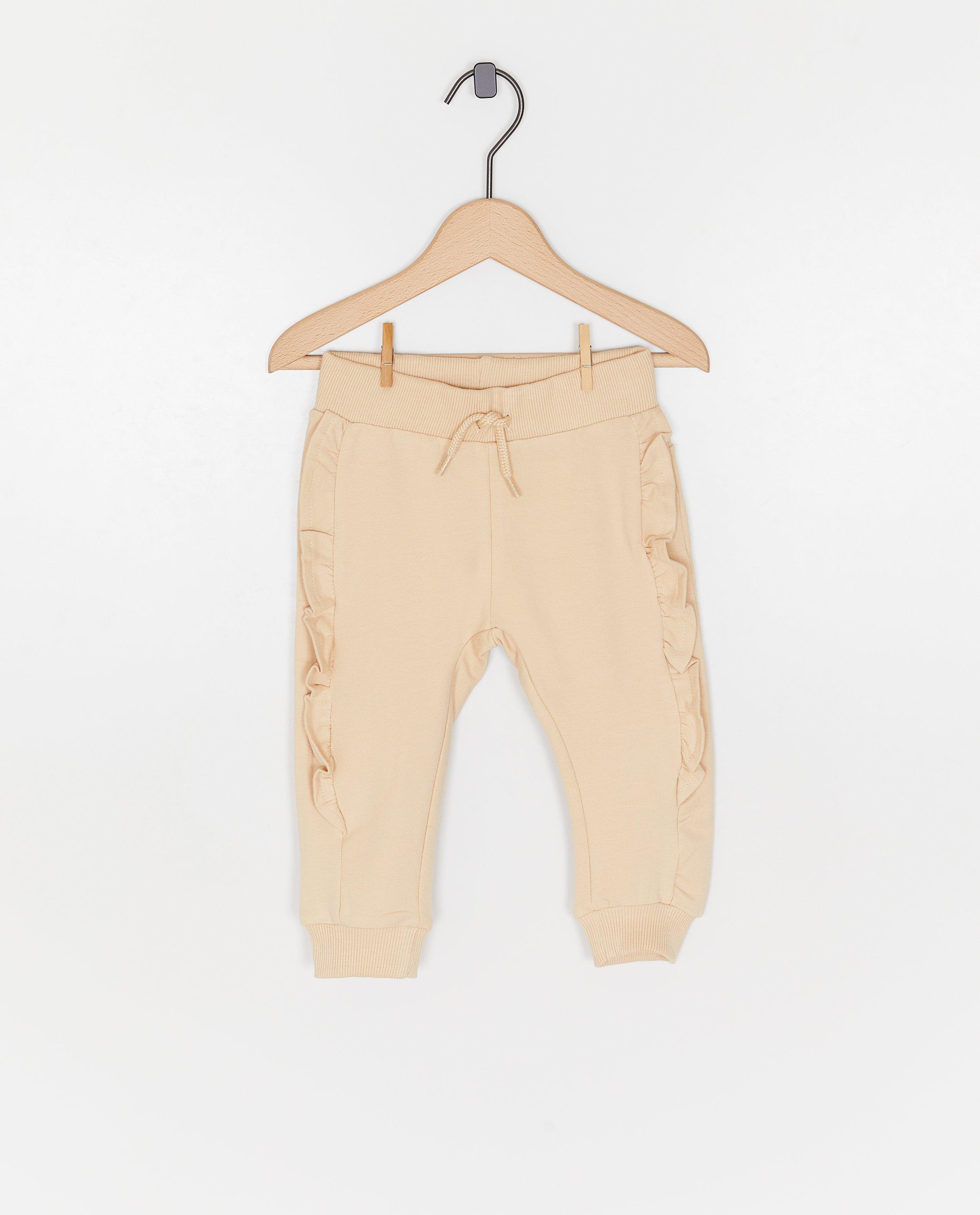 Pantaloni jogging Dirkje cu volane bej deschis