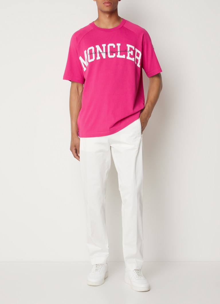 Pantaloni Moncler slim fit cu logo și detalii în dungi.