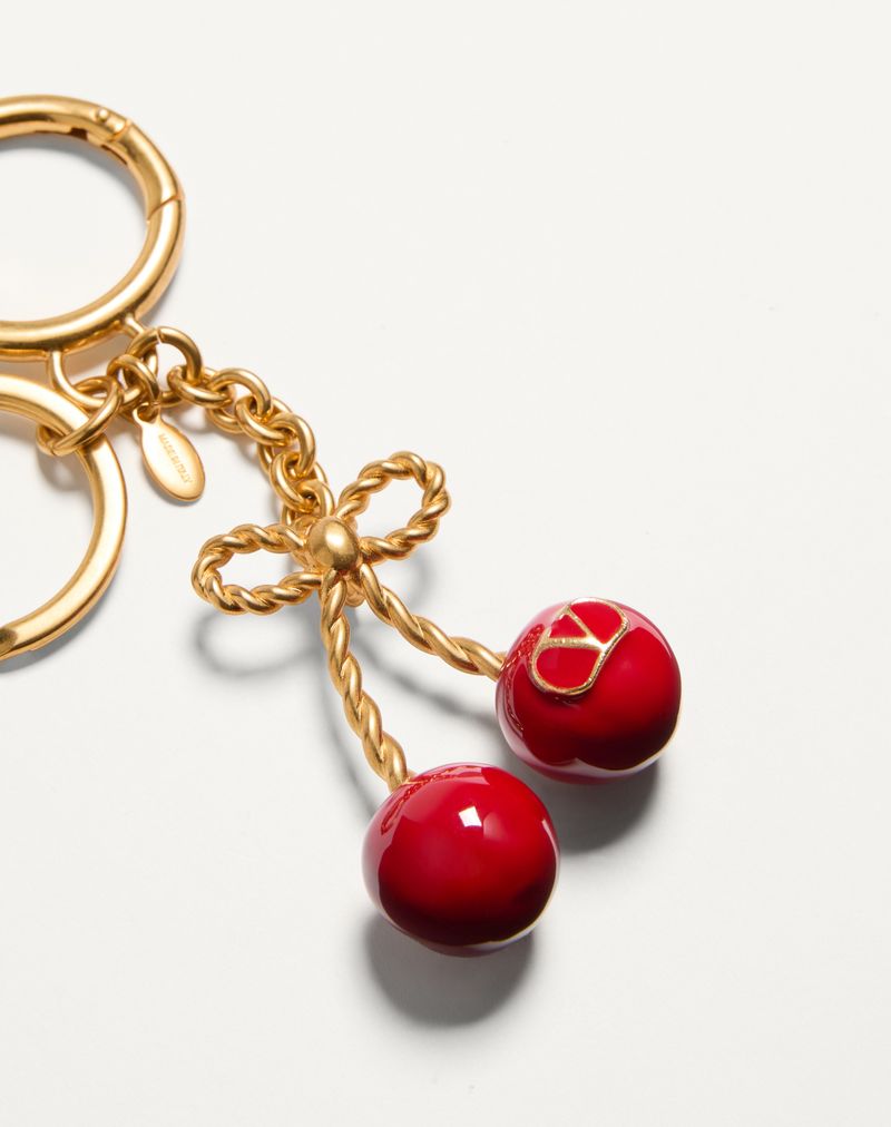 Chaveiro Cherryfic em metal e esmalte com pingente para bolsa