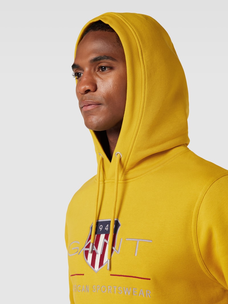 Hoodie mit Känguru-Tasche in gelb