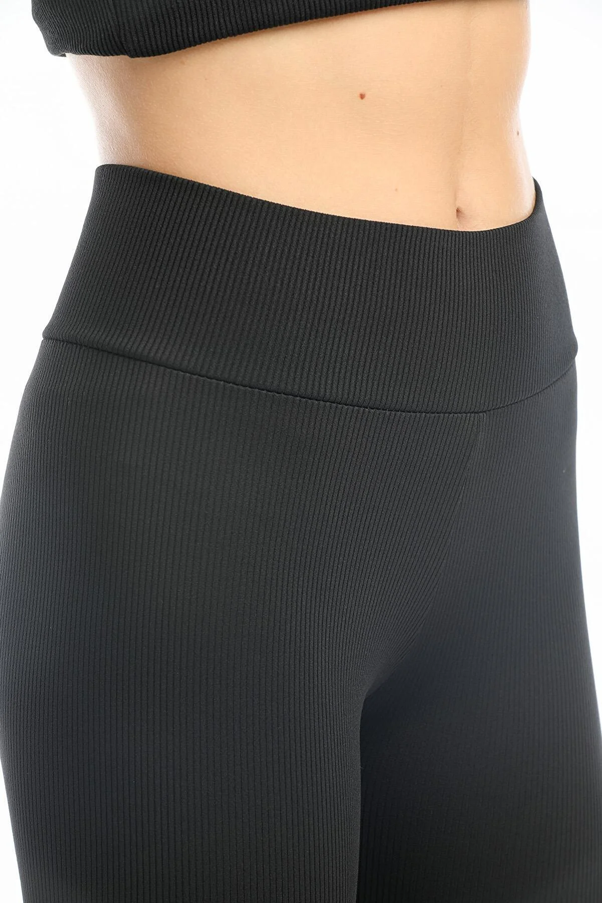 Domoda  Schwarze, gerippte, elastische Strickstrumpfhose mit hoher Taille und Interlock-Taille