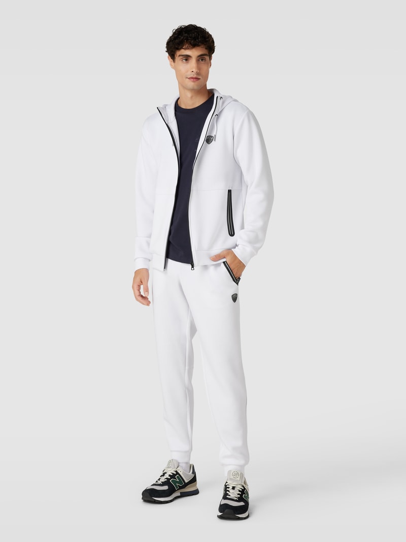 Sweatpants mit Eingrifftaschen in weiß