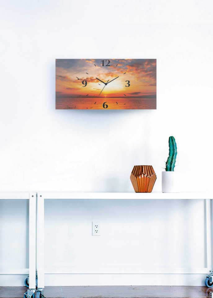 Wanduhr mit Sonnenuntergang-Motiv