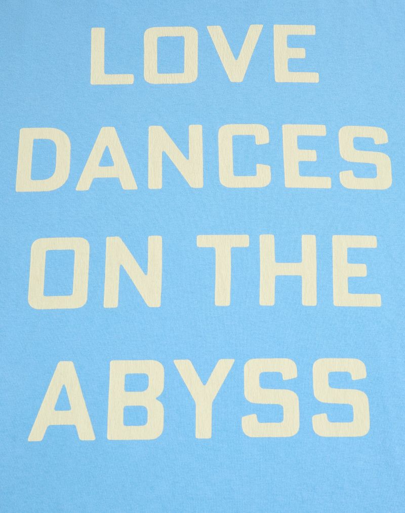Valentino katoenen T-shirt met print 'Love Dances On The Abyss' en 'Made In Valentino'.