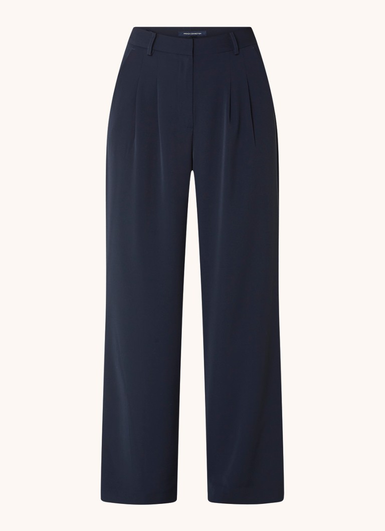 Pantalonii Harry au talie înaltă, talie lată pe picioare și buzunare laterale. Designul lor amintește de French Connection.