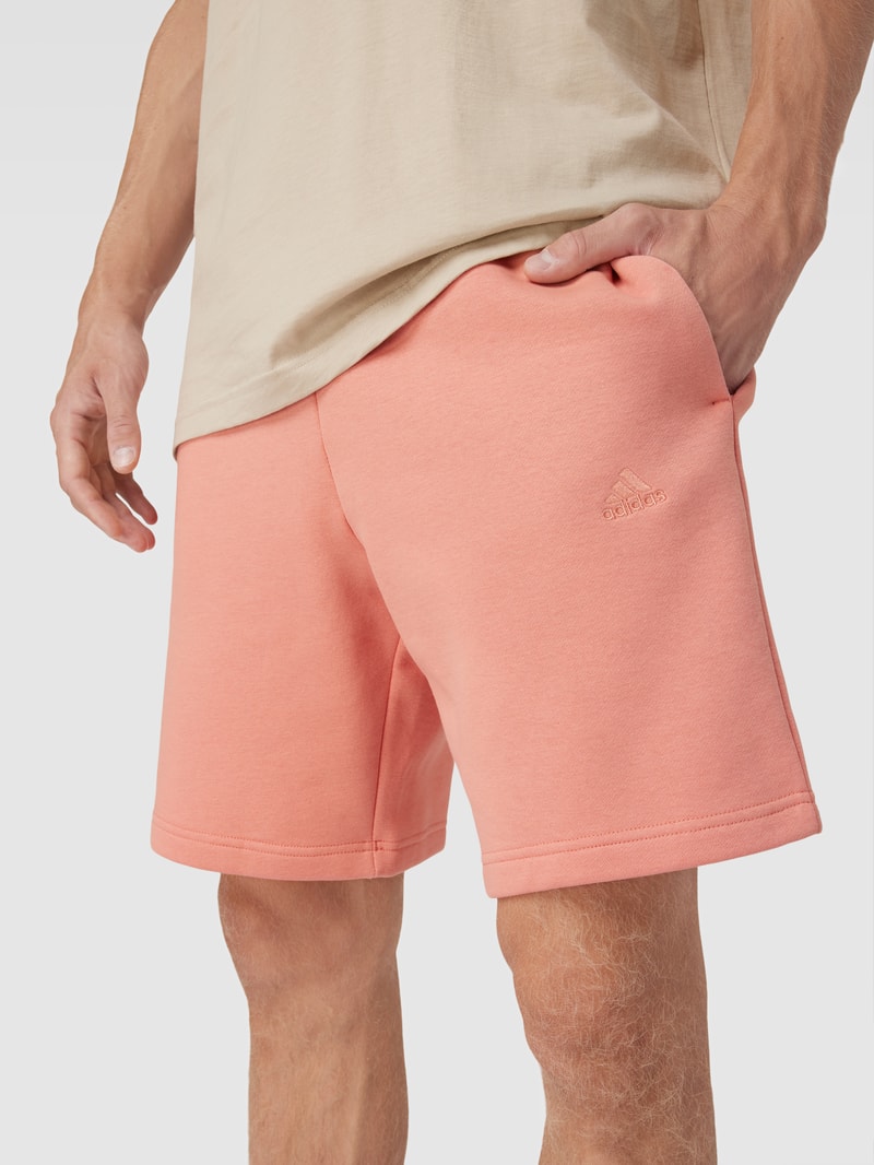 Shorts mit Label-Stitching in koralle