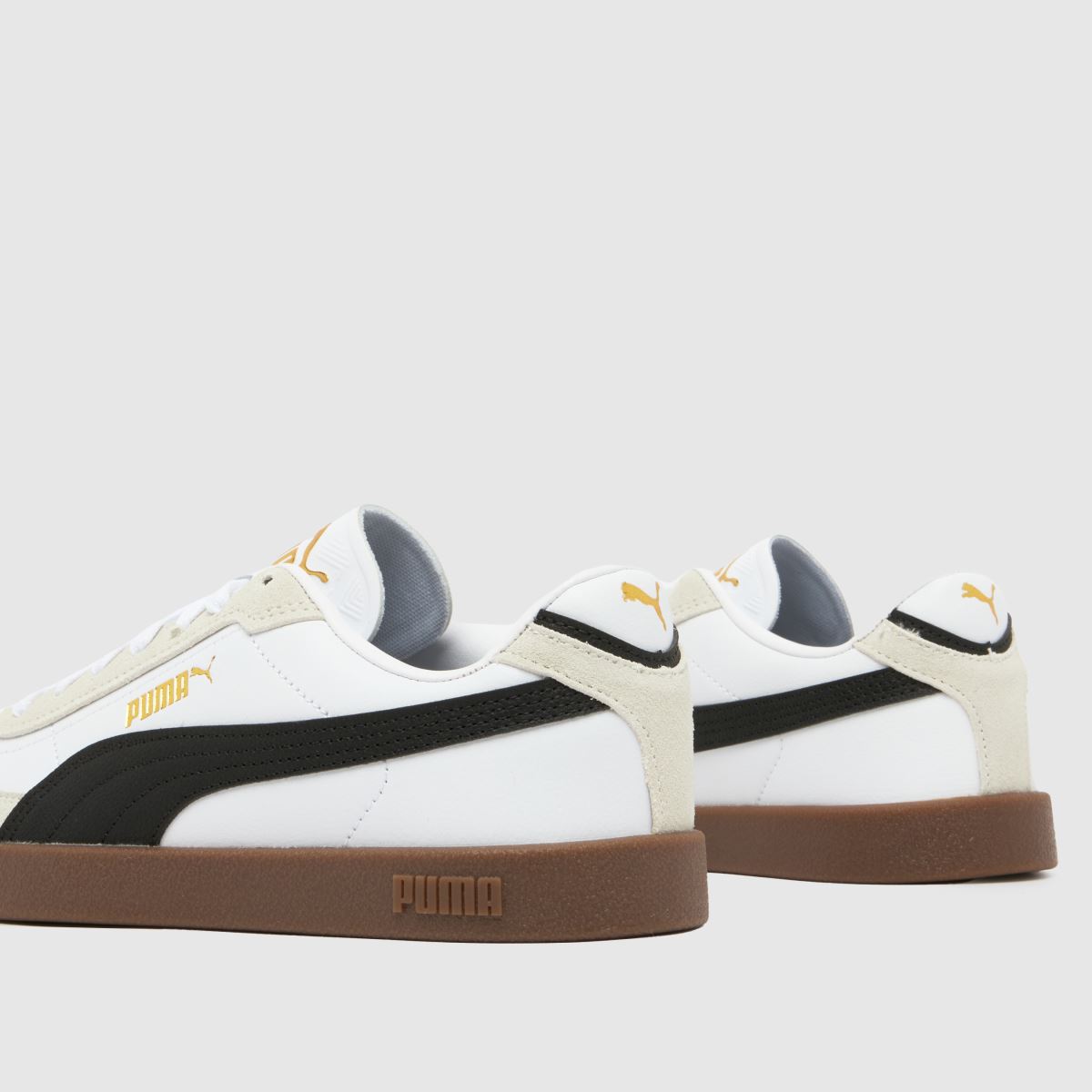 PUMA vita och svarta Club II Era ungdomsskor