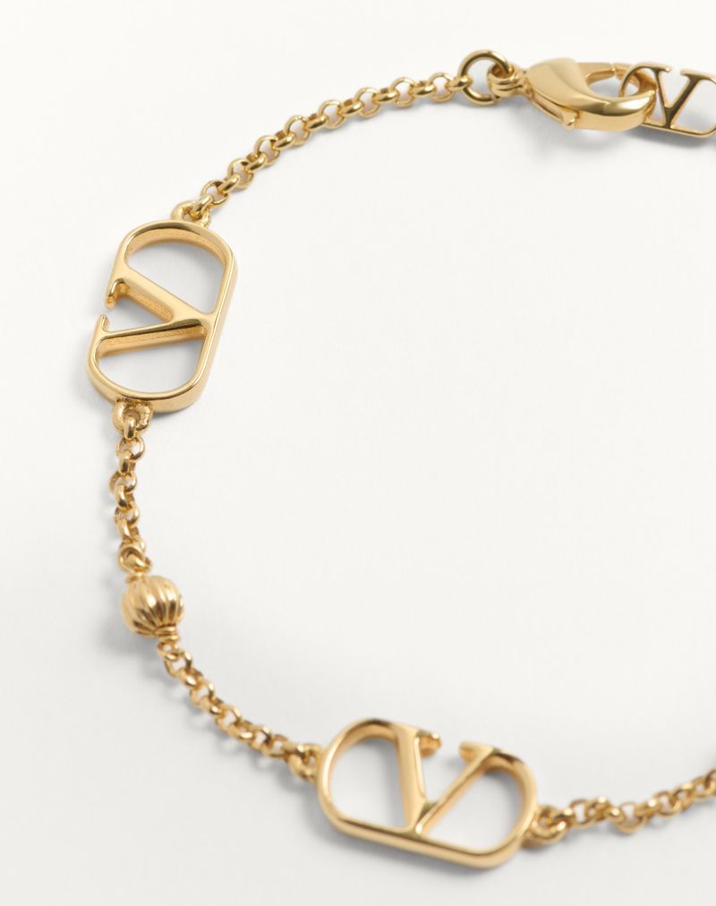 Pulseira de metal com assinatura VLogo