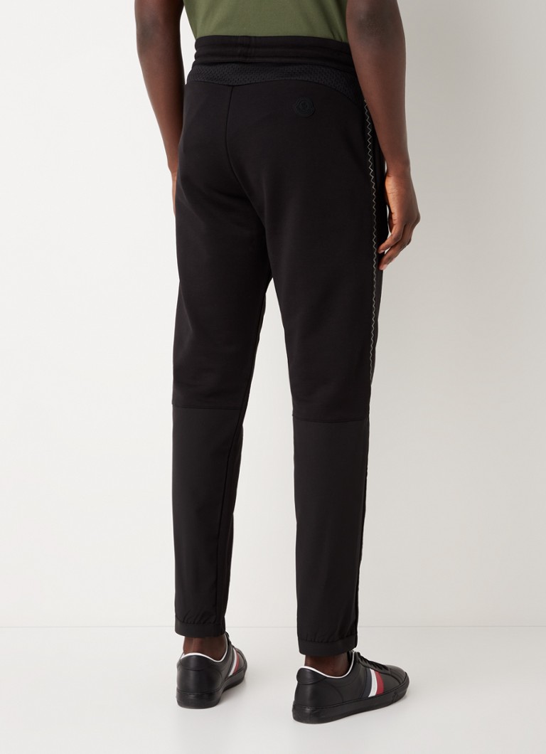 Pantaloni de trening Moncler slim fit cu imprimeu