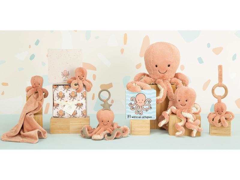 Anneau en bois avec peluche poulpe Odell rose