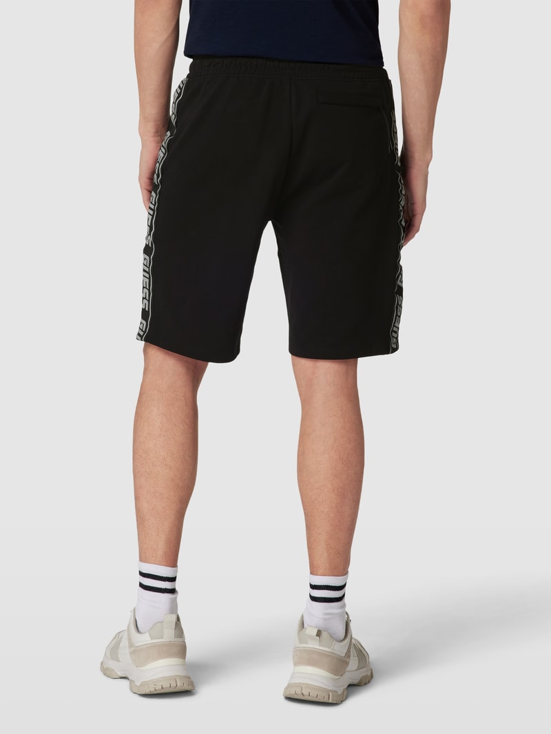 Sweatshorts mit Galonstreifen in schwarz