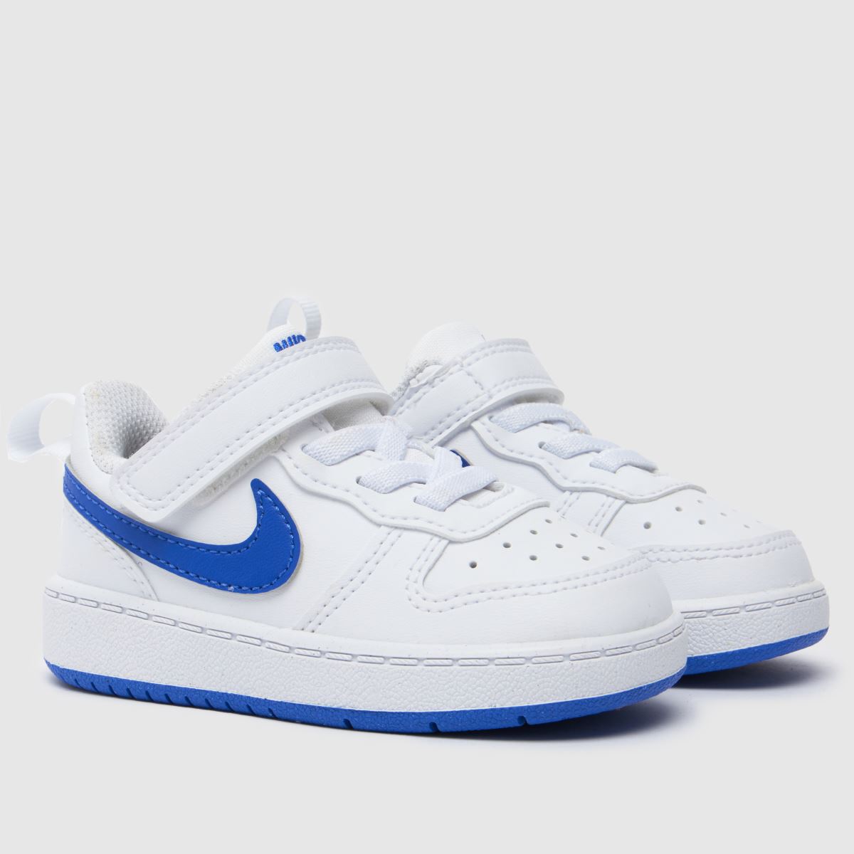 Bílo-tmavomodré nízké tenisky Nike Court Borough pro chlapce a batolata