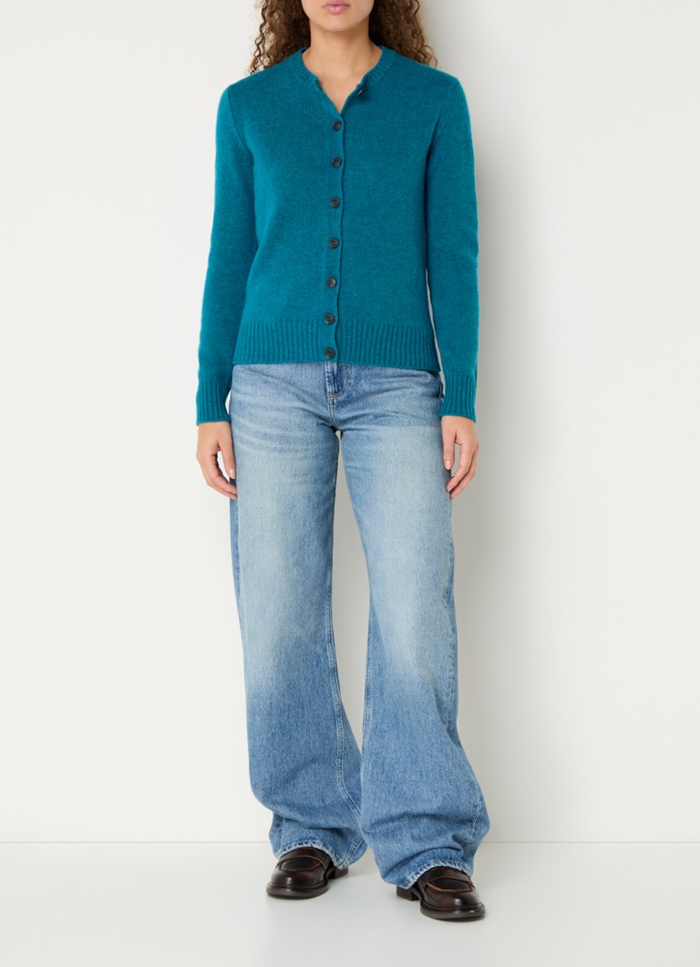 Cardigan Benetton cu guler rotund, confecționat din lână fină.