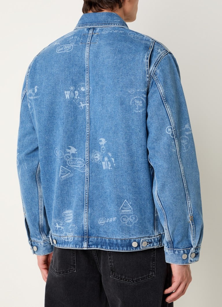 Giacca in denim Carhartt WIP Stamp con tasche applicate.