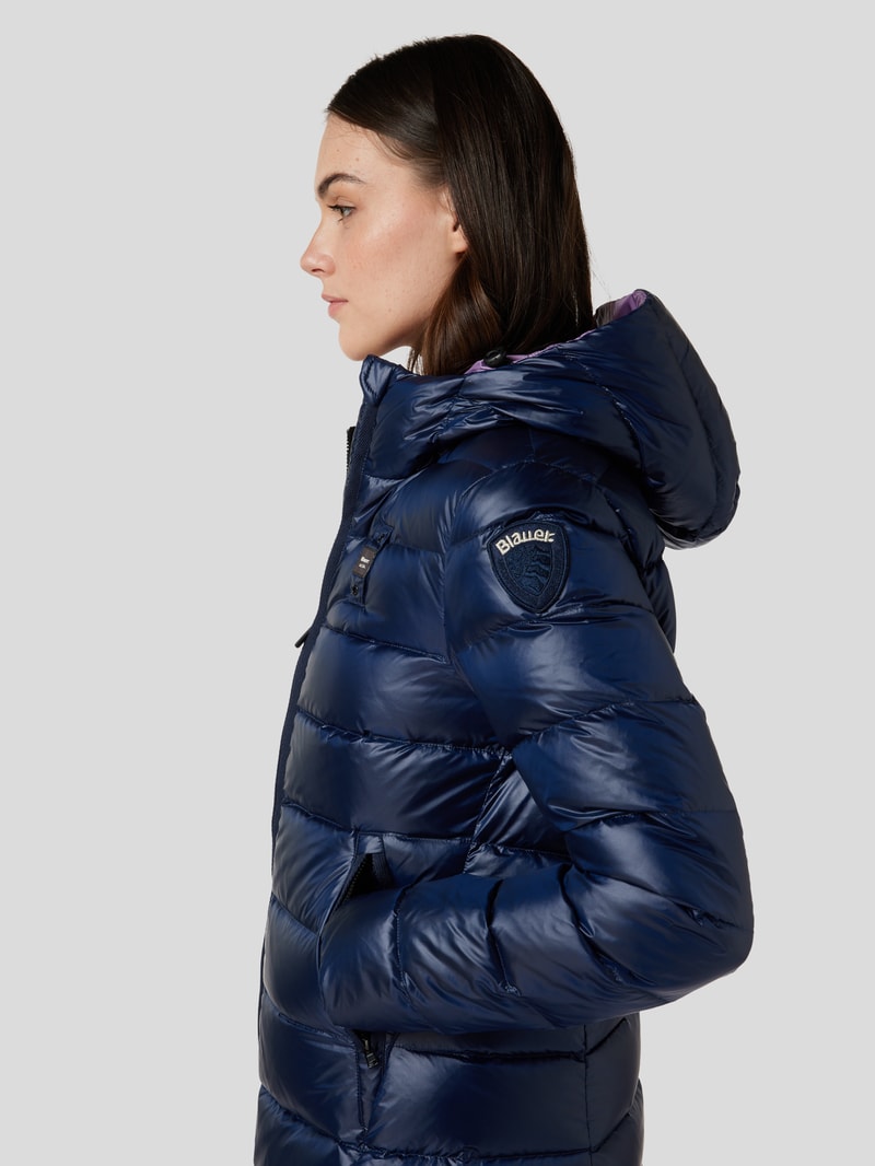 Steppmantel mit Stehkragen in marineblau