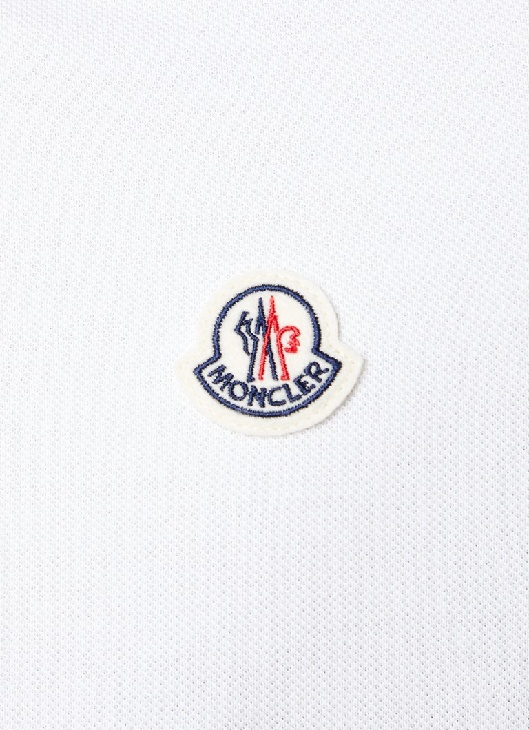 Tricou polo Moncler cu croială clasică, manșete contrastante și logo.