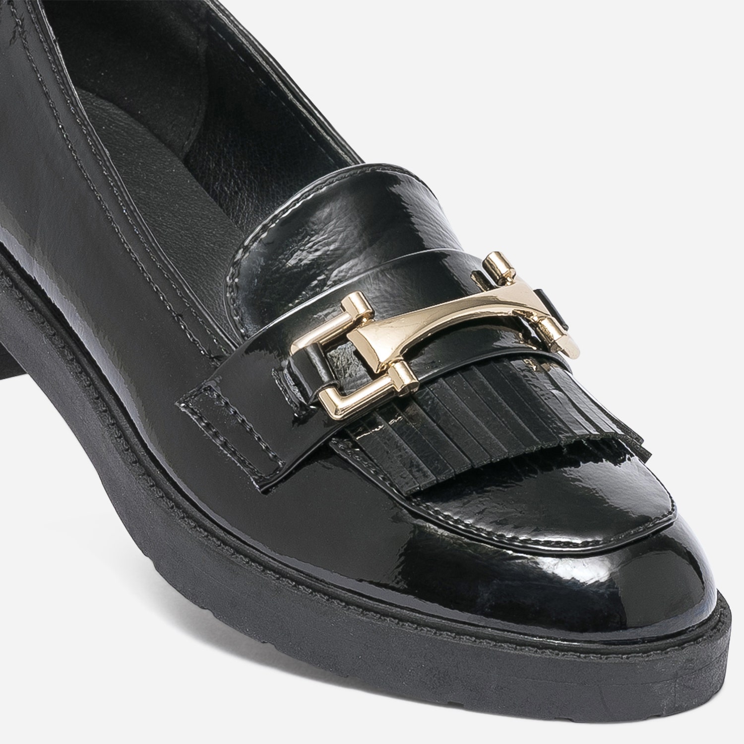 Mocassin noir verni à franges