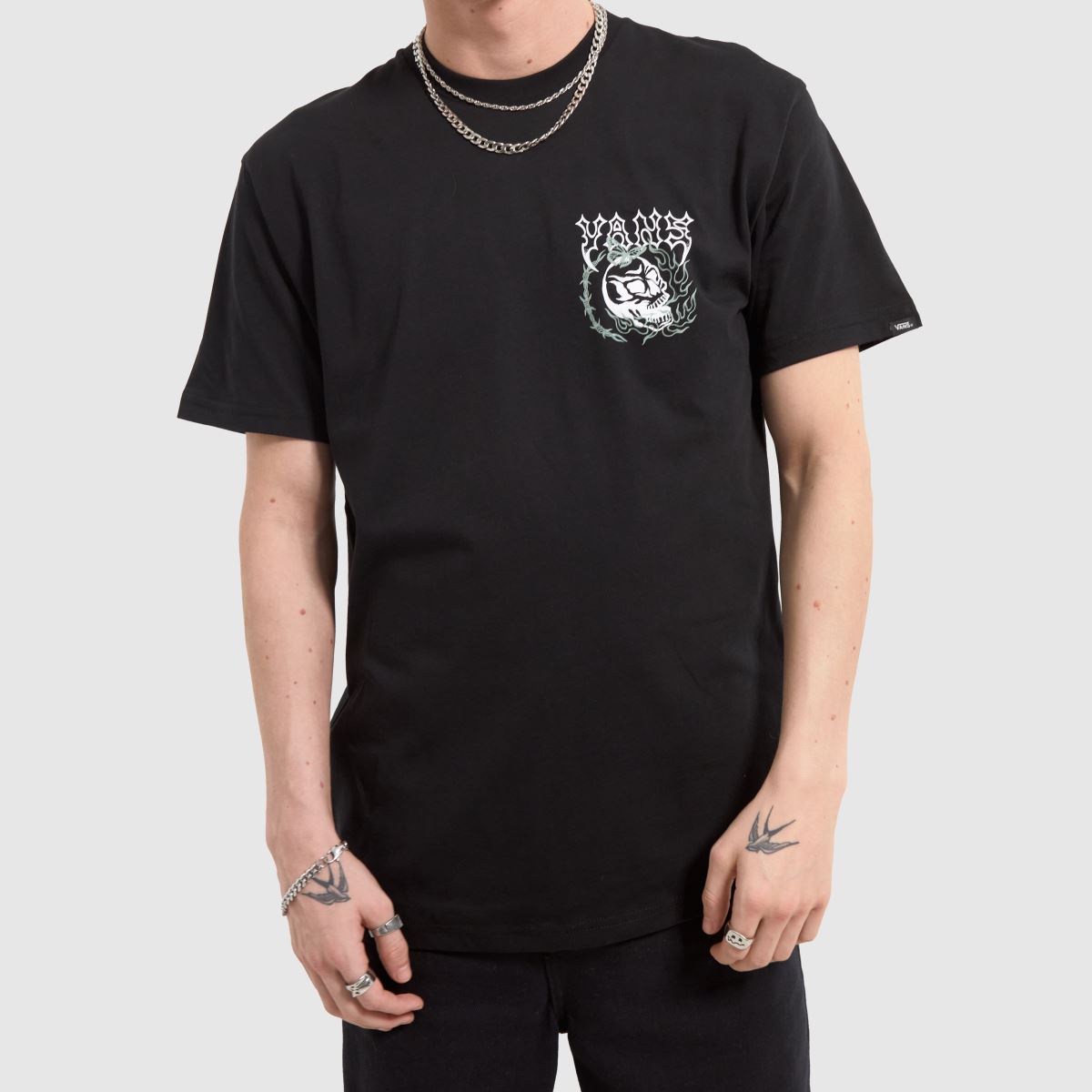 Vans – Svart och vit t-shirt med lucky streak-motiv