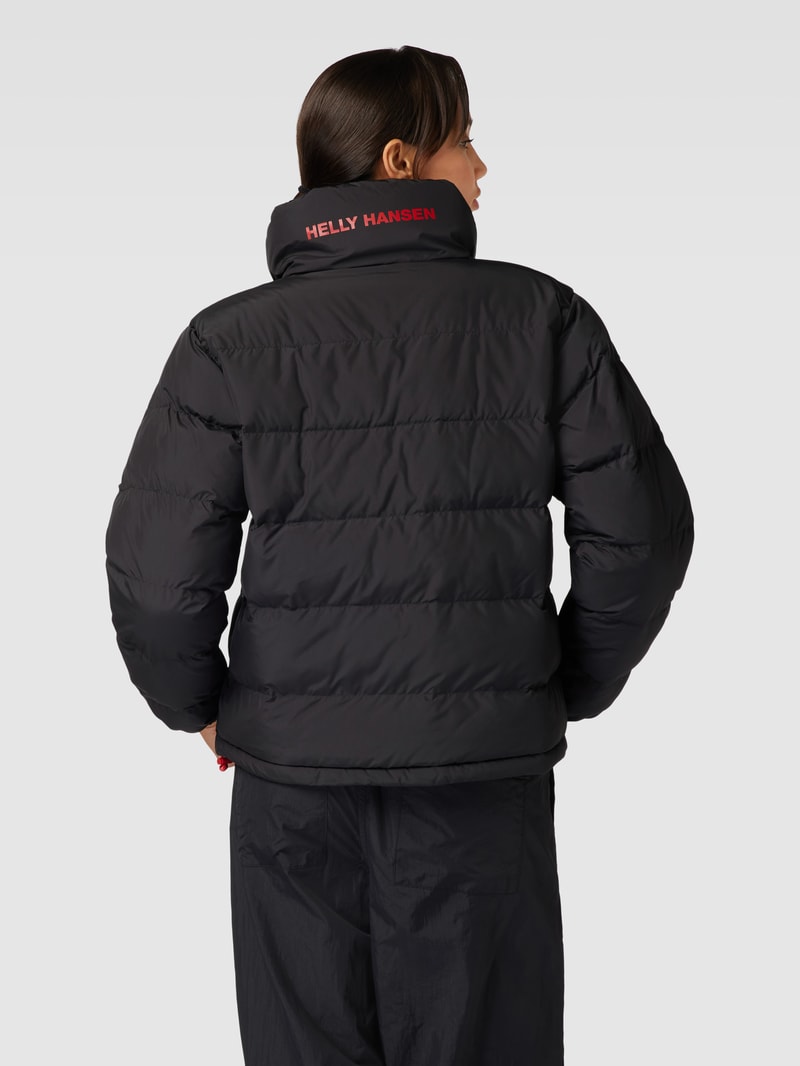 Steppjacke mit Wendefunktion in schwarz