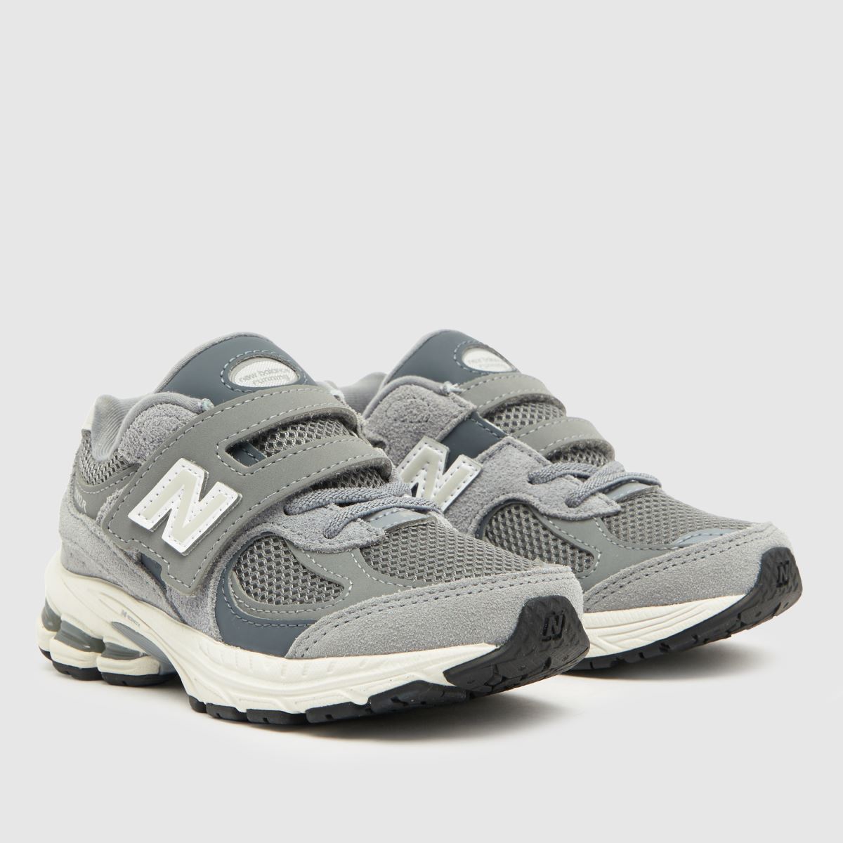 New Balance ljusgrå 2002 v Junior träningsskor