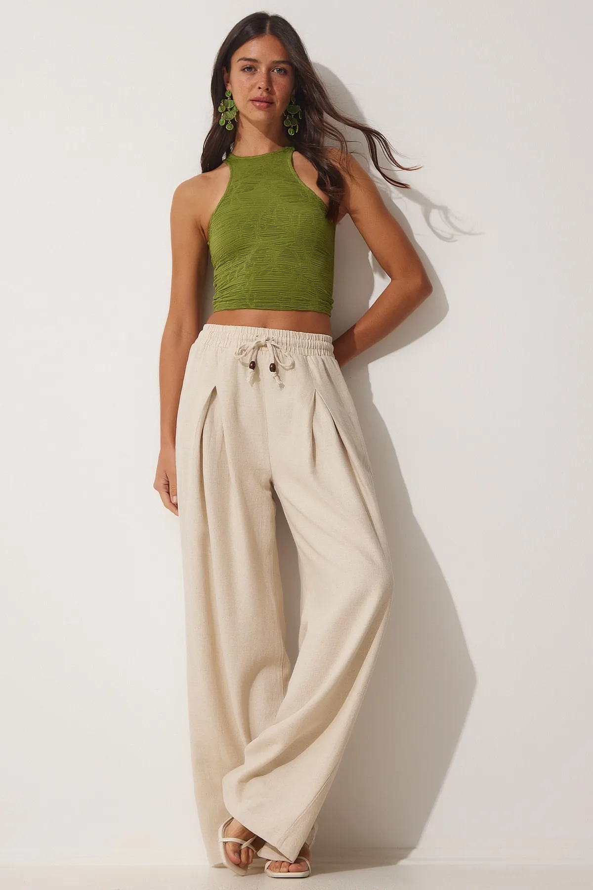 Happiness İstanbul  Cremefarbene lockere Palazzo-Hose aus Rohleinen für Damen NS00388