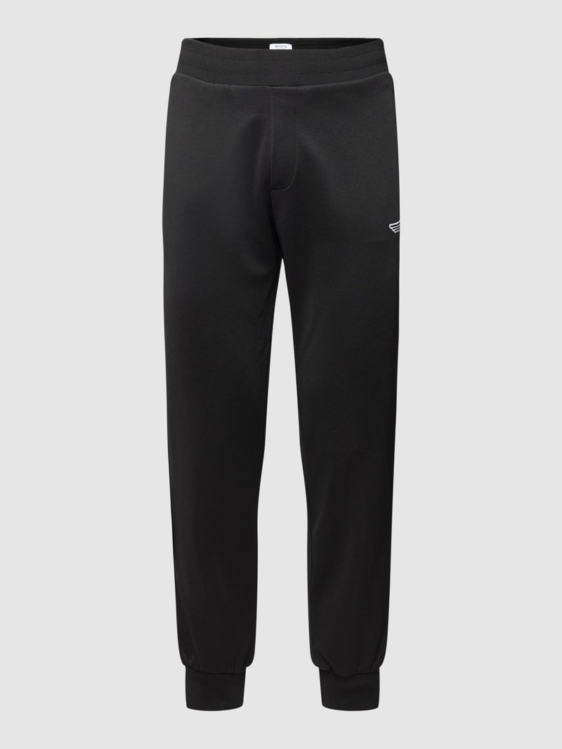 Sweatpants mit Label-Patch in schwarz