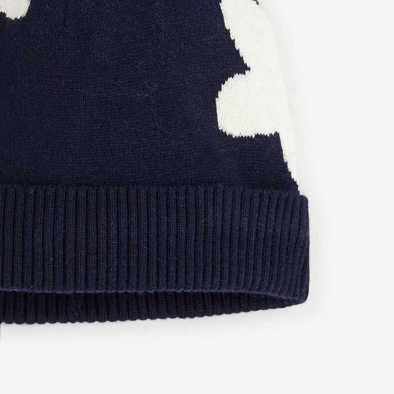 Bonnet fleuri bébé fille bleu marine en tricot Catimini