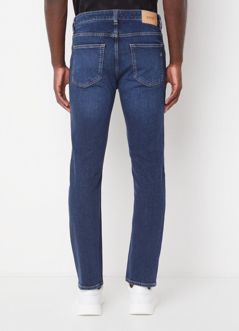 Blugi HUGO BOSS H-Delaware, croială slim, de culoare închisă, cu buzunare laterale.