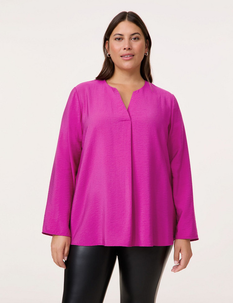 Fein schimmernde Bluse