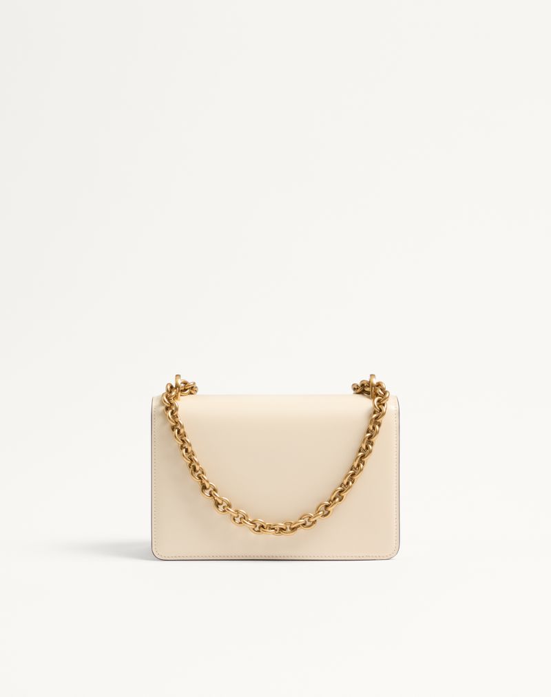 Bolsa de ombro pequena Valentino Garavani Vain em couro de bezerro brilhante