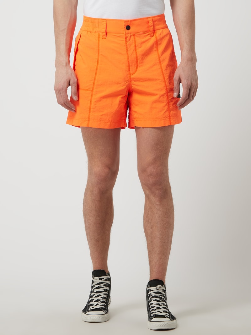 Shorts mit Meshfutter in neon orange