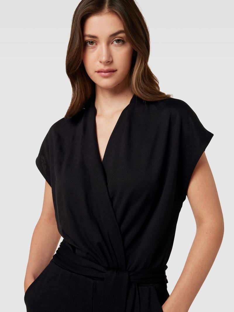Jumpsuit in Wickel-Optik mit Bindegürtel in schwarz