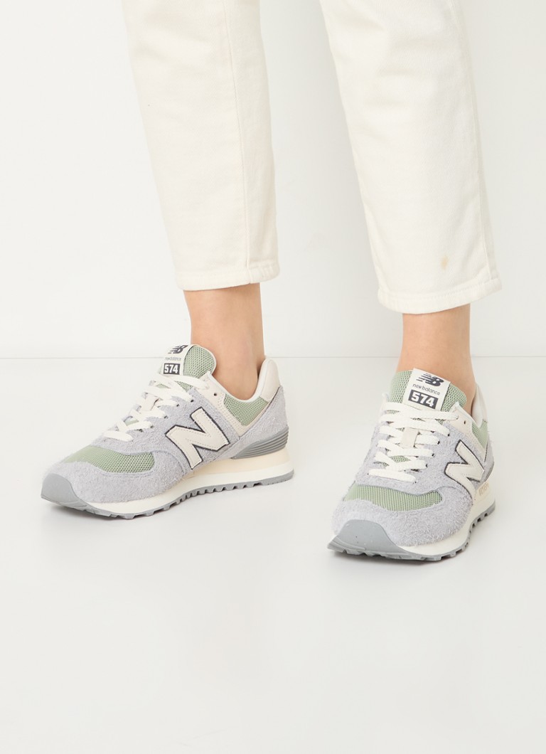 New Balance 574 zamšādas kedas ar sietiņa detaļām